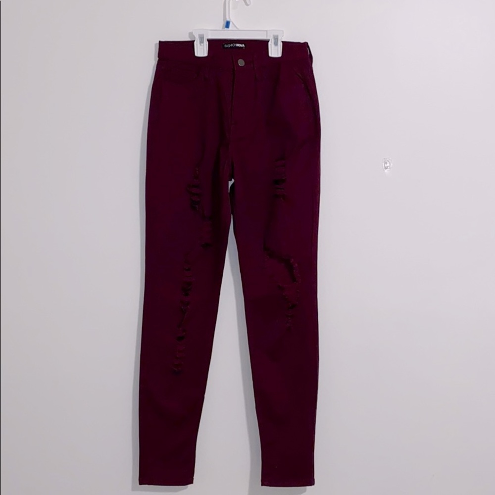 High waisted maroon ripped skinny jeans
